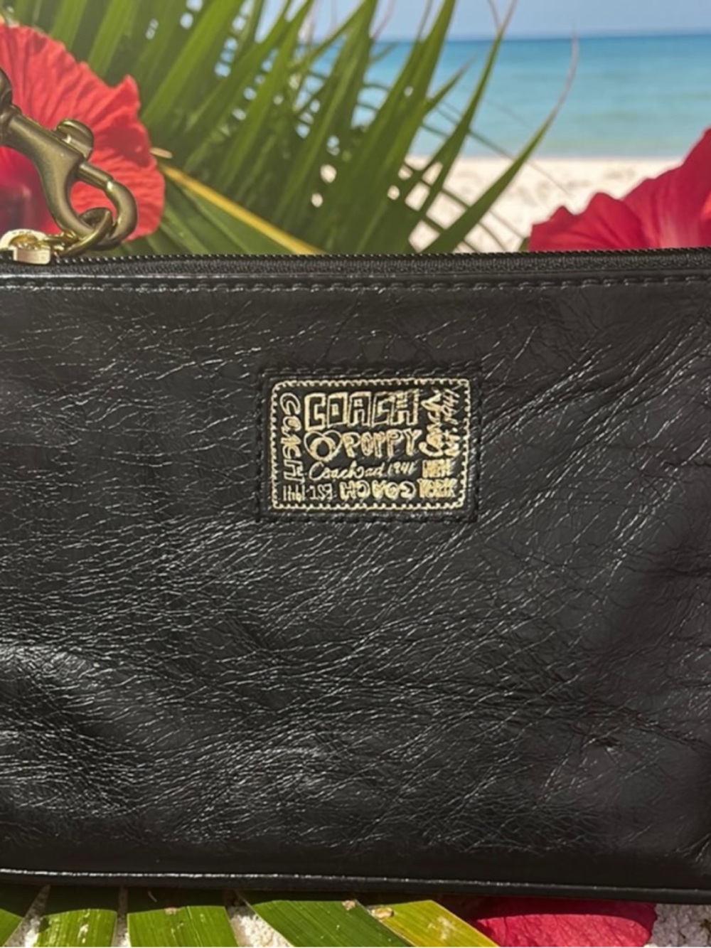 Coach Black Leather Wristlet with Gold Logo Patch